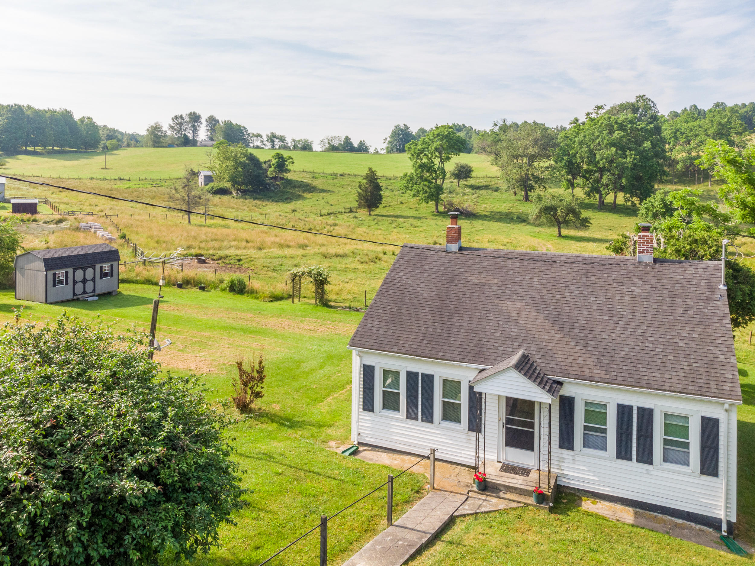 856 Conner Grove Road Southwest Willis, VA 24380 - Photo 4 of 63 a view of a house with a lake view