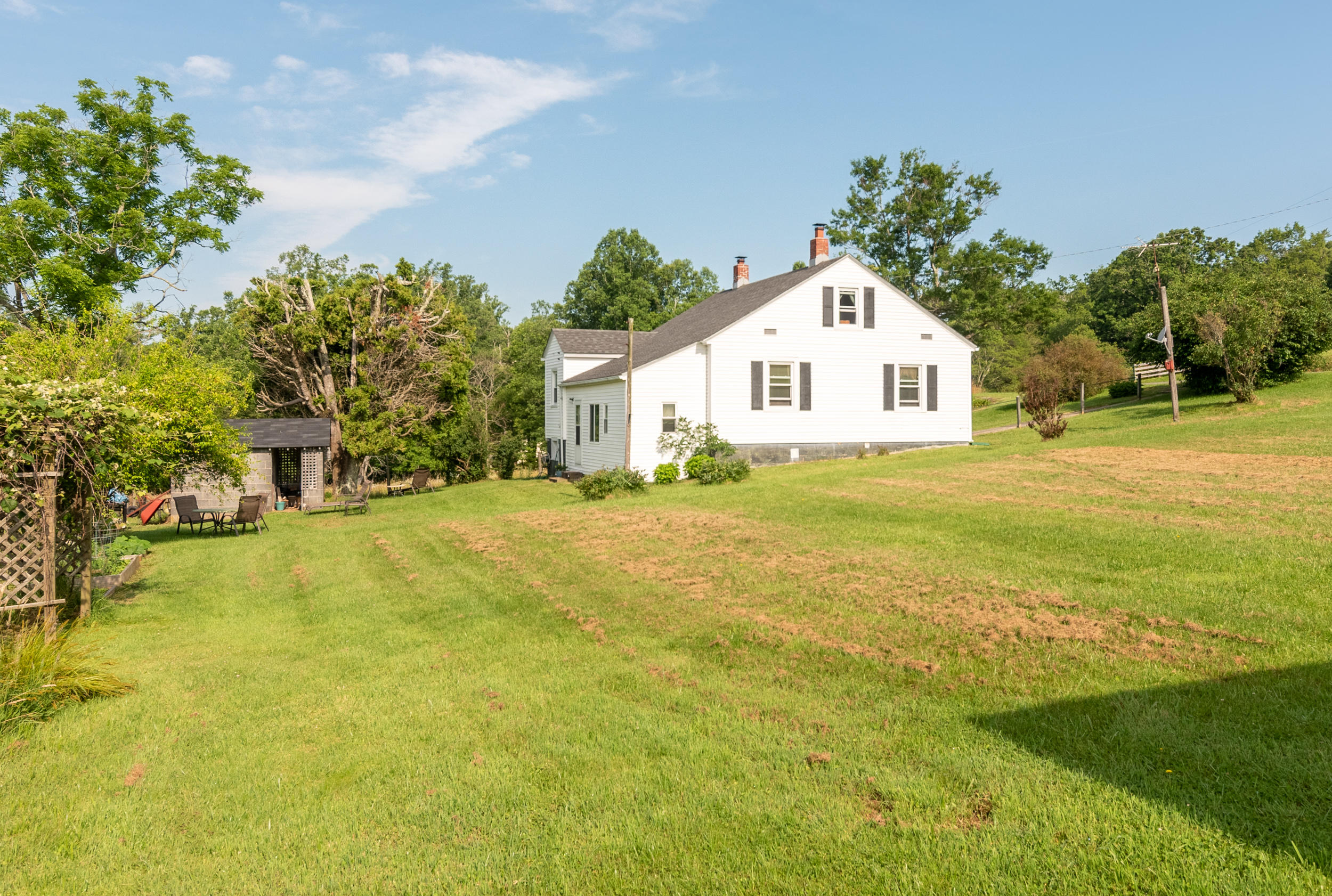 856 Conner Grove Road Southwest Willis, VA 24380 - Photo 55 of 63 a view of a house with a yard and garage
