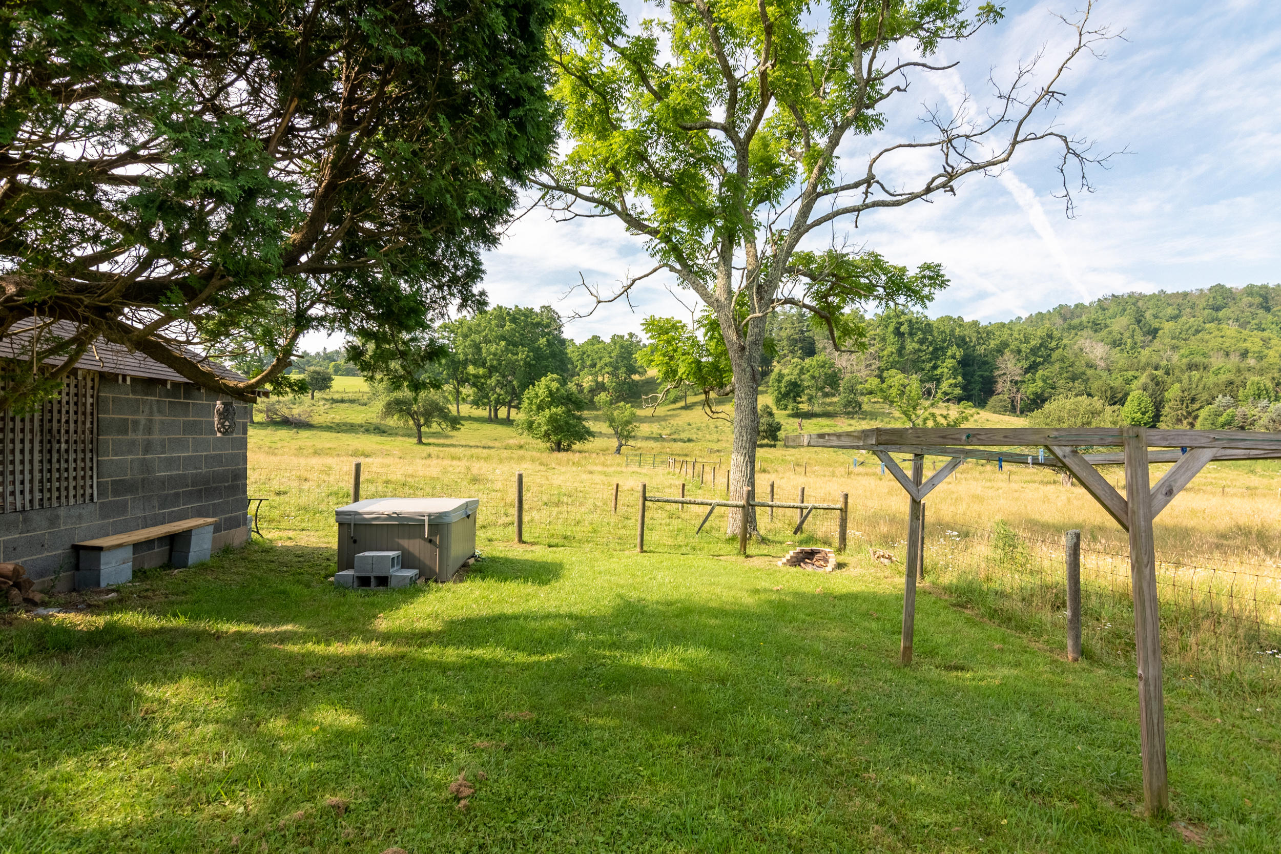 856 Conner Grove Road Southwest Willis, VA 24380 - Photo 61 of 63 a swimming pool with outdoor seating and yard