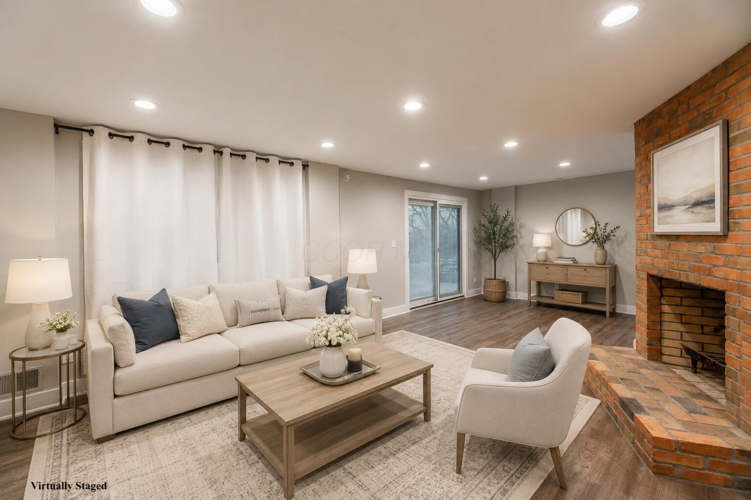 2248 Sandover Road Columbus, OH 43220 - Photo 24 of 36 Lower level living room (virtual stage)