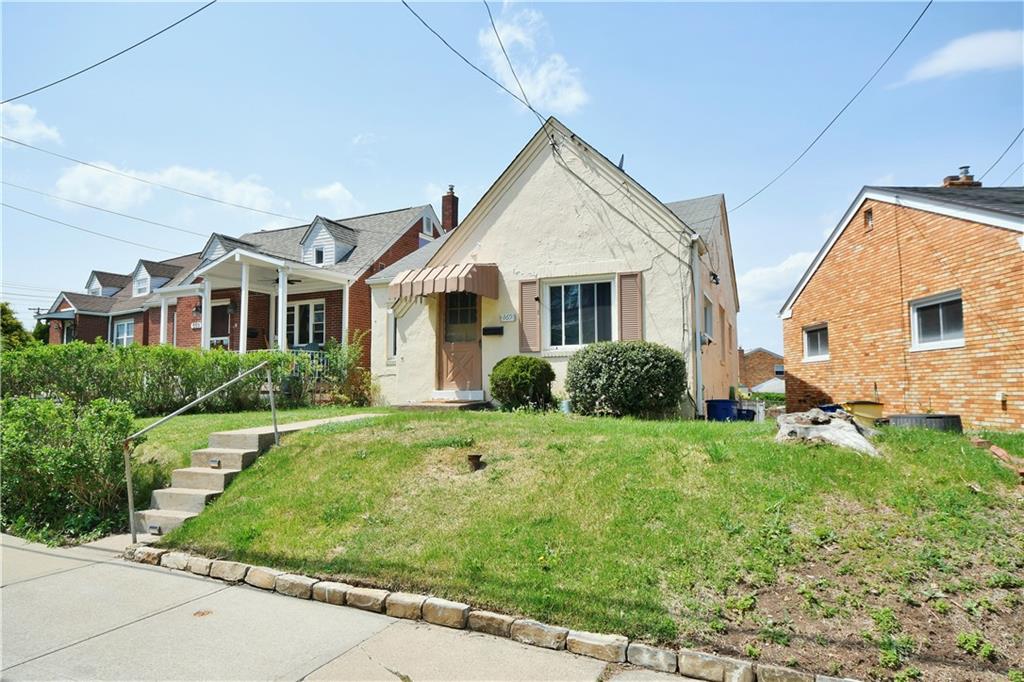 569 Loretto Road Pittsburgh, PA 15217 - Photo 3 of 18 a view of a house with a yard