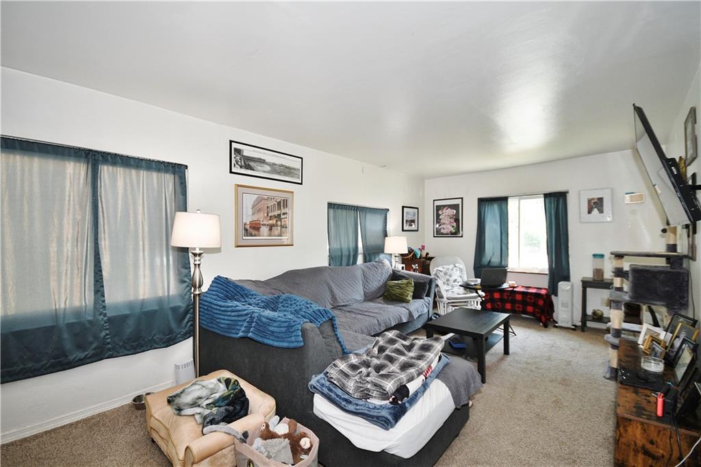 569 Loretto Road Pittsburgh, PA 15217 - Photo 5 of 18 a living room with furniture and a window