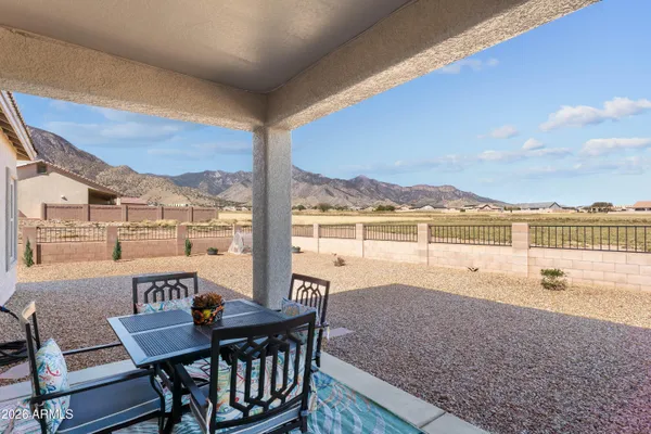 a view of a balcony with lake view and mountain view