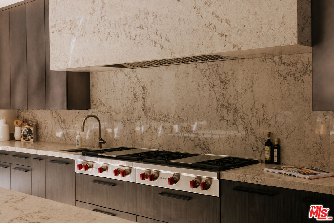 219 Homewood Road Los Angeles, CA 90049 - Photo 11 of 40 a close view of sink and stove