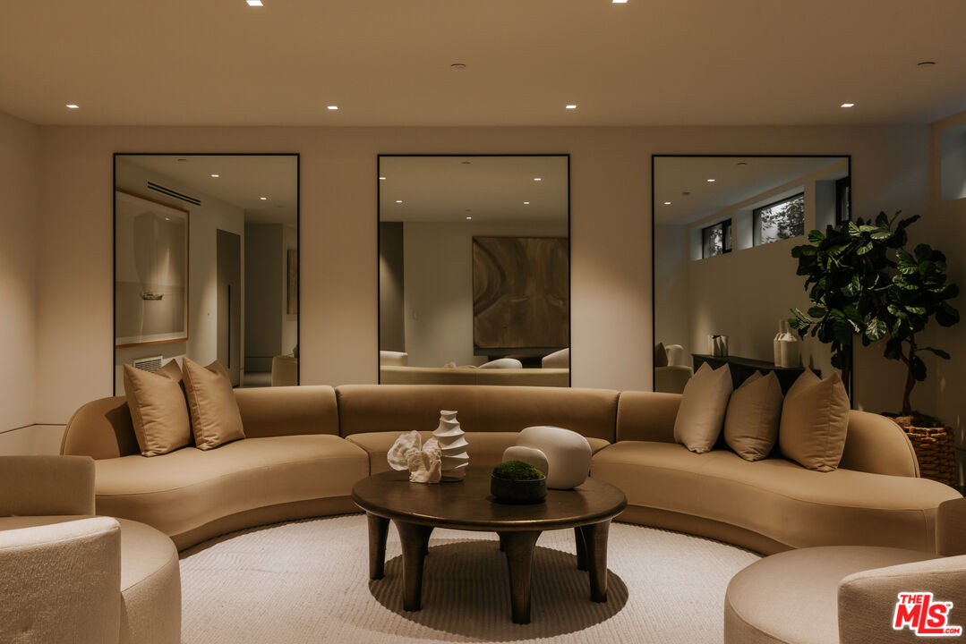 219 Homewood Road Los Angeles, CA 90049 - Photo 34 of 40 a living room with furniture and a large window