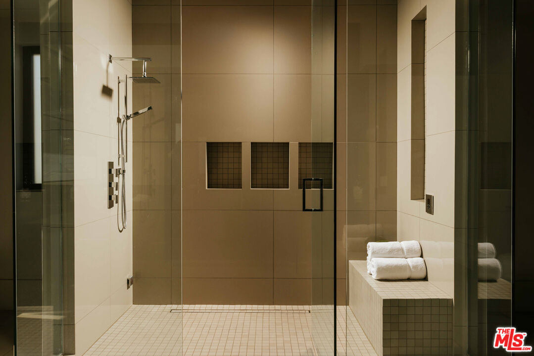 219 Homewood Road Los Angeles, CA 90049 - Photo 35 of 40 a bathroom with a shower