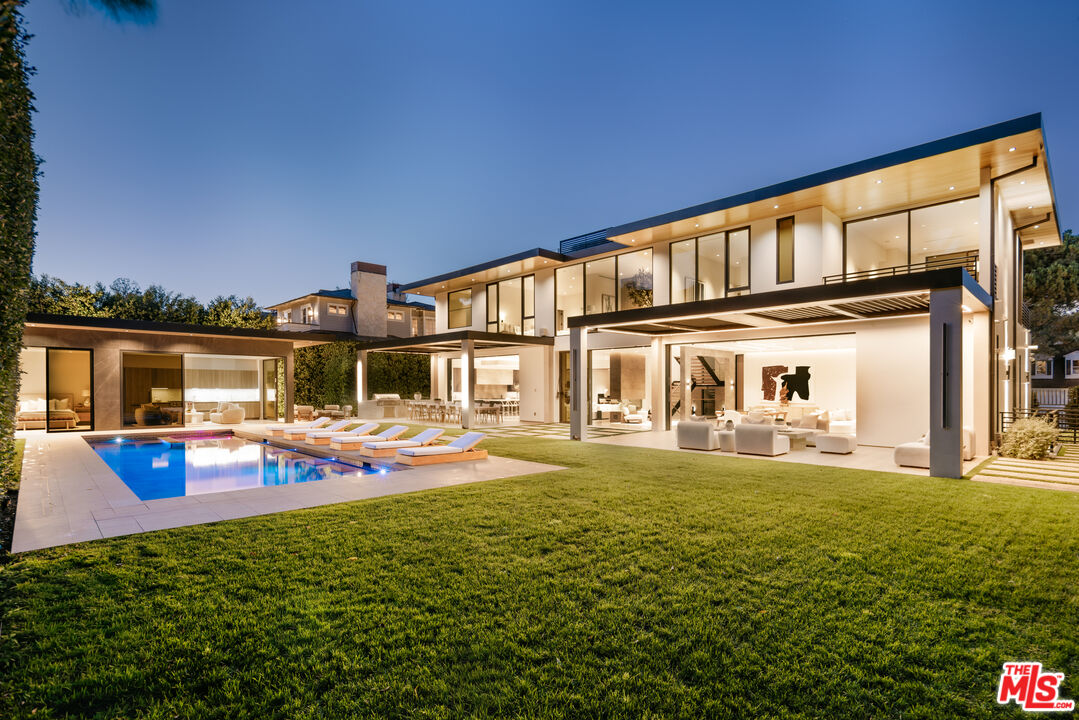 219 Homewood Road Los Angeles, CA 90049 - Photo 37 of 40 a view of a house with a swimming pool