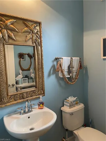 a close view of a sink and a stove in a room