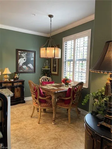 a bathroom with a mirror and a sink