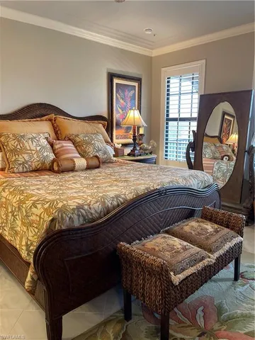 a view of walk in closet with clothes