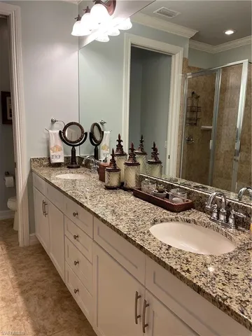 a en suite bathroom with a tub and mirror