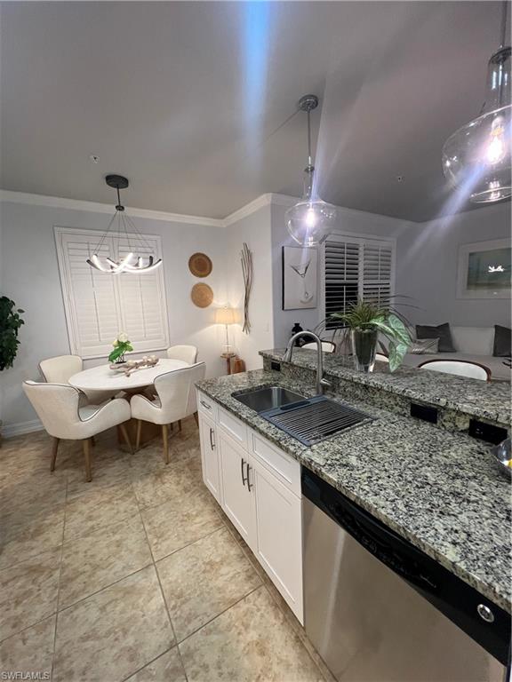 9081 Albion Lane South, Unit 6510 Naples, FL 34113 - Photo 6 of 31 a bathroom with a granite countertop sink and a mirror