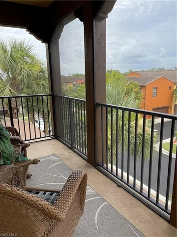 a kitchen with stainless steel appliances granite countertop a stove a sink a dining table and chairs