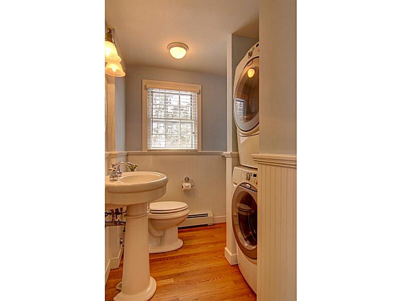 15 Ridgewood Road Barrington, RI 02806 - Photo 13 of 22 Bathroom. Remodeled half bath on first floor includes full-size washer and dryer.