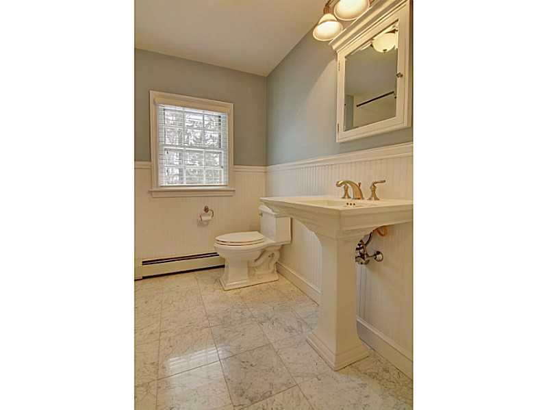 15 Ridgewood Road Barrington, RI 02806 - Photo 19 of 22 Bathroom. Stunning main bath on second floor has tub with shower and marble floors.