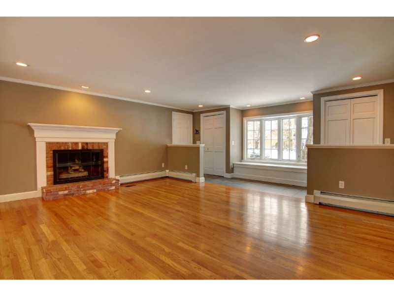 15 Ridgewood Road Barrington, RI 02806 - Photo 9 of 22 Den/Family/Great Room. Spacious family room features gas fireplace and access from the two-car garage through mud-room area.