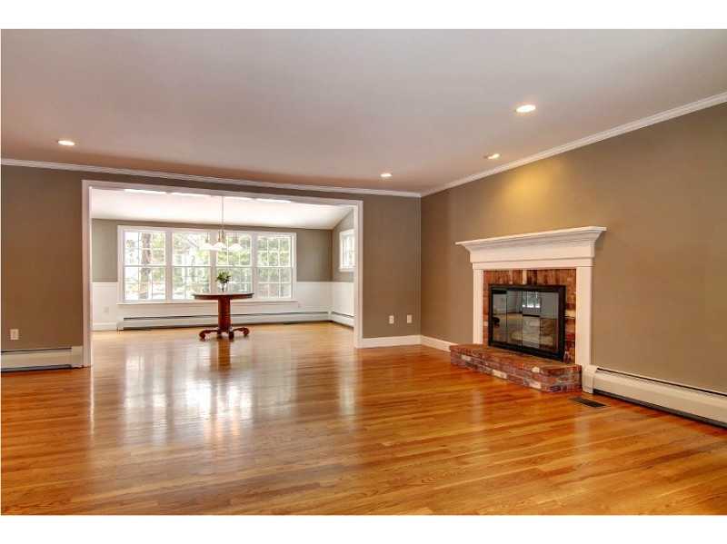 15 Ridgewood Road Barrington, RI 02806 - Photo 10 of 22 Den/Family/Great Room. Family room flows into dining area and out to the backyard.