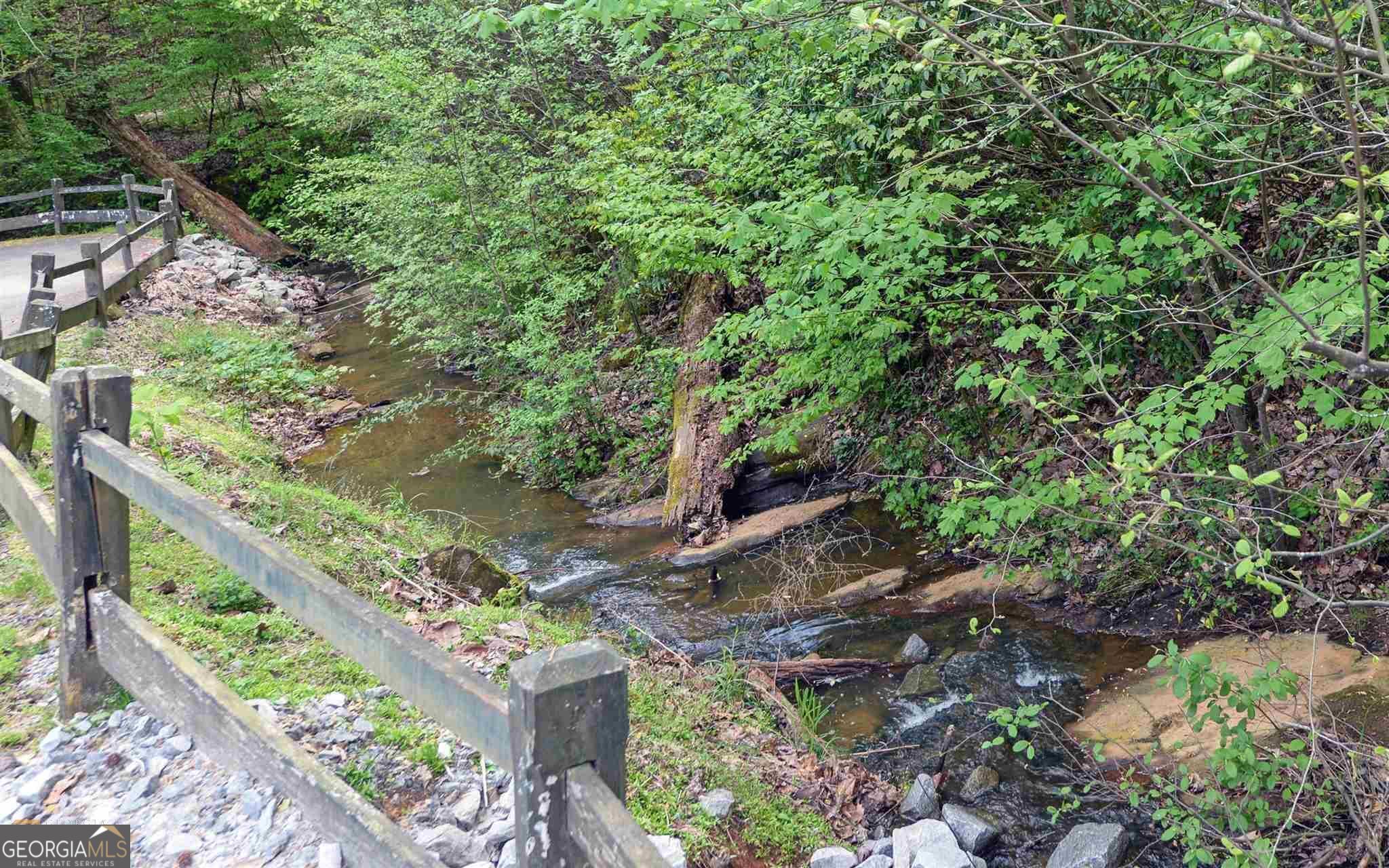 4835 Upper Berkshire Road Flowery Branch, GA 30542 - Photo 14 of 16 a picture of trees