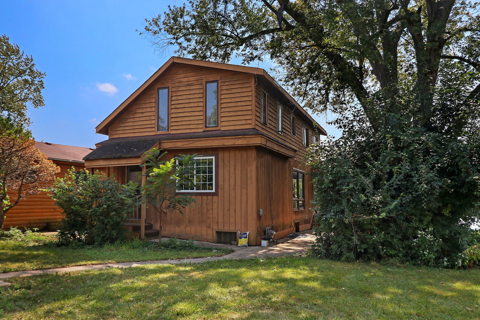1109 Spring Beach Way Cary, IL 60013 - Photo 1 of 1 a front view of house with yard