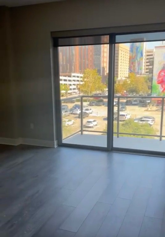 1475 Texas Street, Unit 415 Houston, TX 77002 - Photo 5 of 11 a view of an empty room with a window