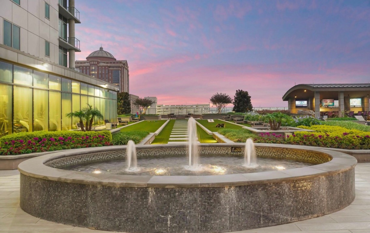 1475 Texas Street, Unit 415 Houston, TX 77002 - Photo 8 of 11 a view of a swimming pool with a yard