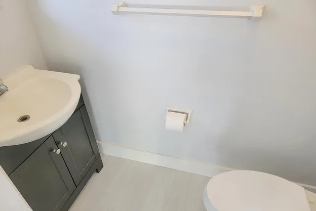 a bathroom with a sink and toilet