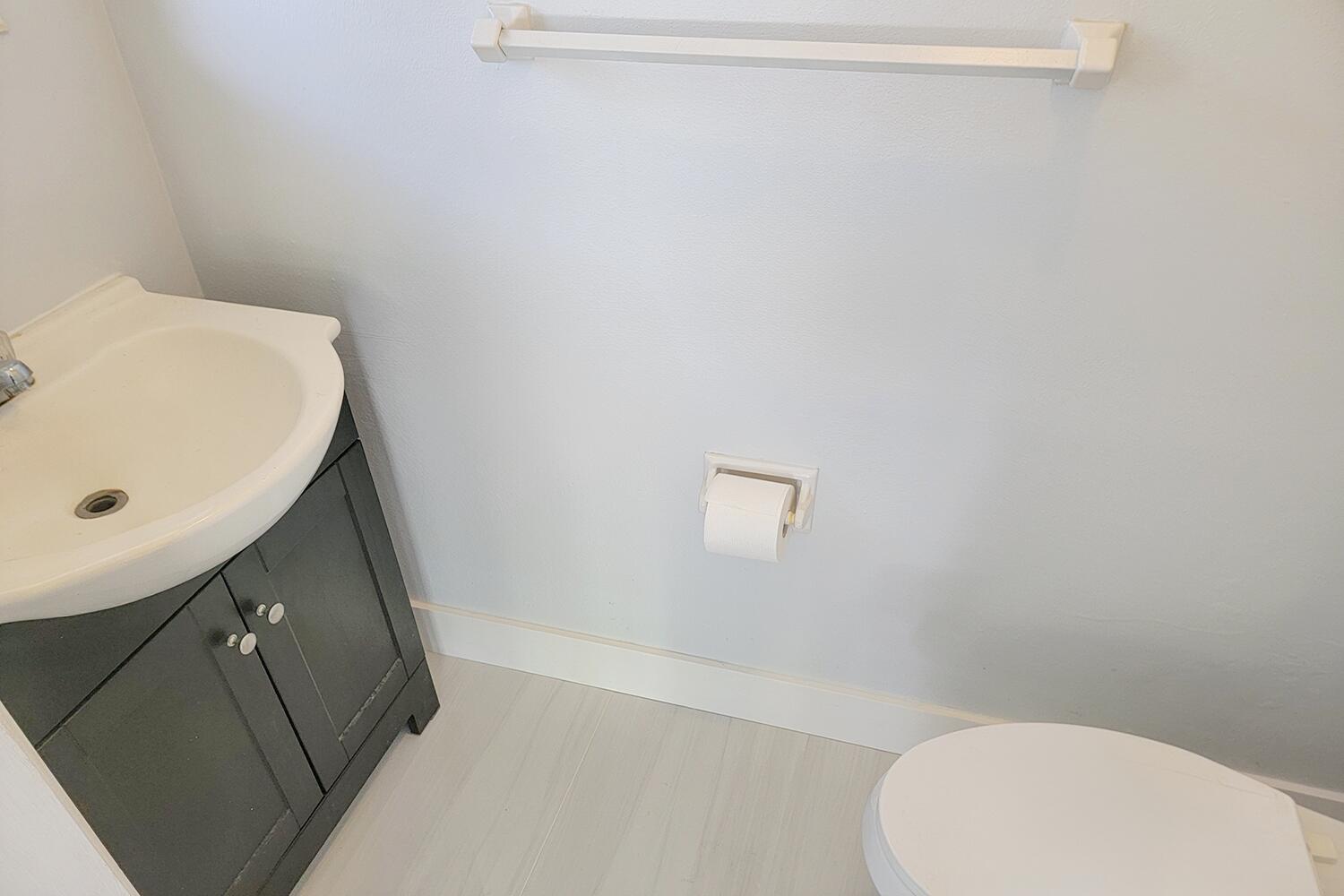 655 Castilla Lane Boynton Beach, FL 33435 - Photo 17 of 23 a bathroom with a sink and toilet