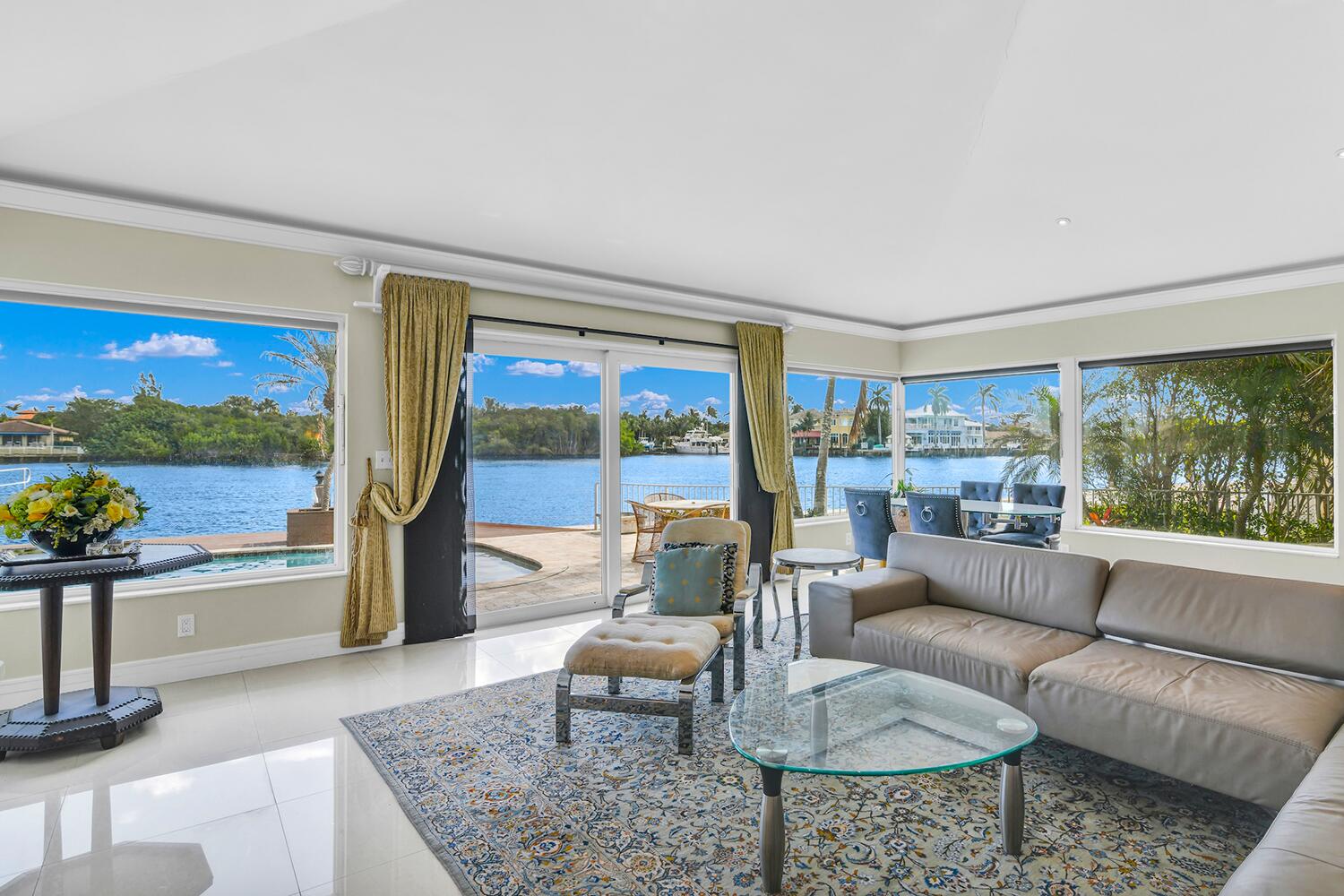655 Castilla Lane Boynton Beach, FL 33435 - Photo 3 of 23 a living room with furniture and a large window