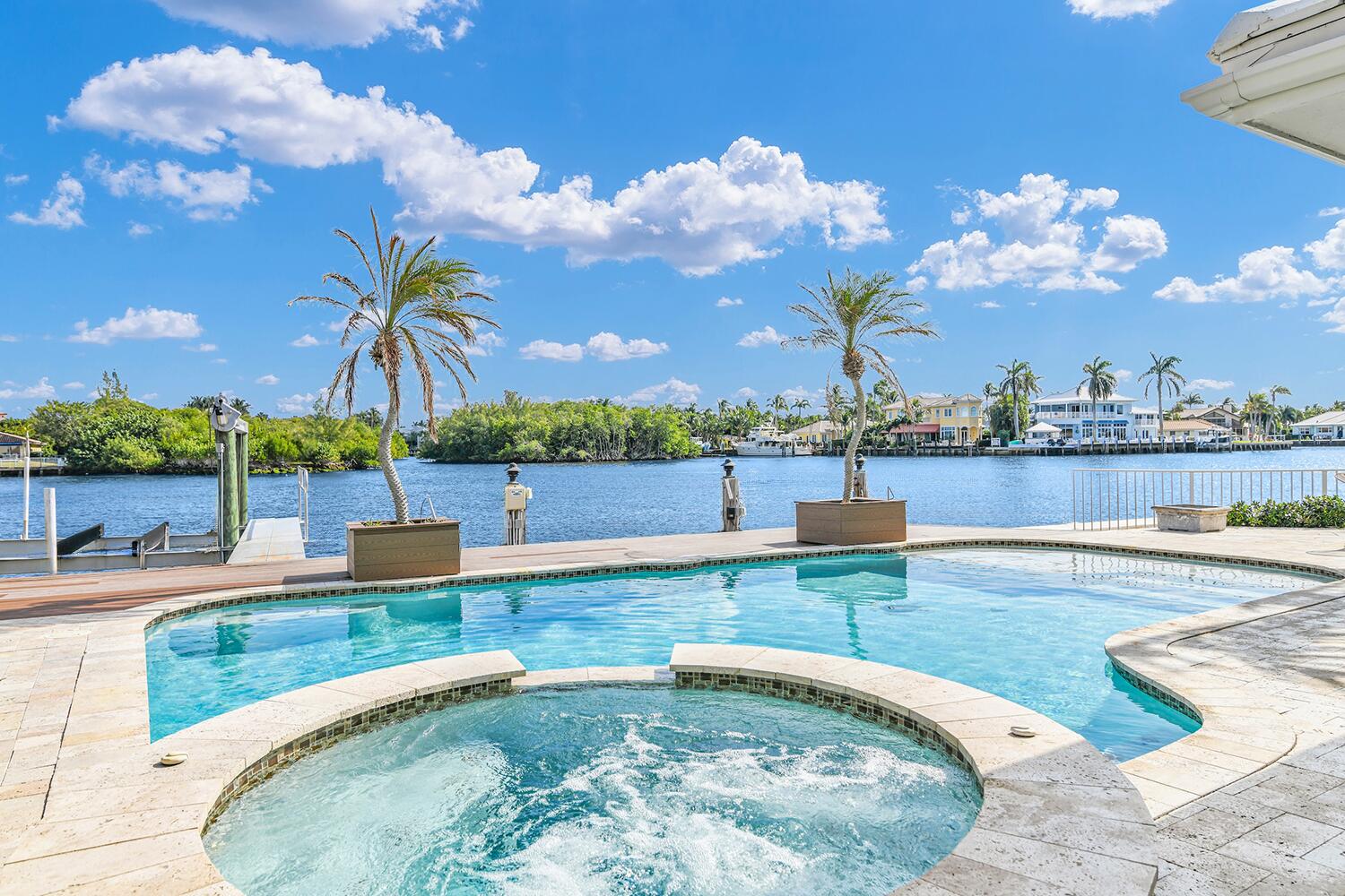 655 Castilla Lane Boynton Beach, FL 33435 - Photo 4 of 23 a view of a swimming pool and a terrace