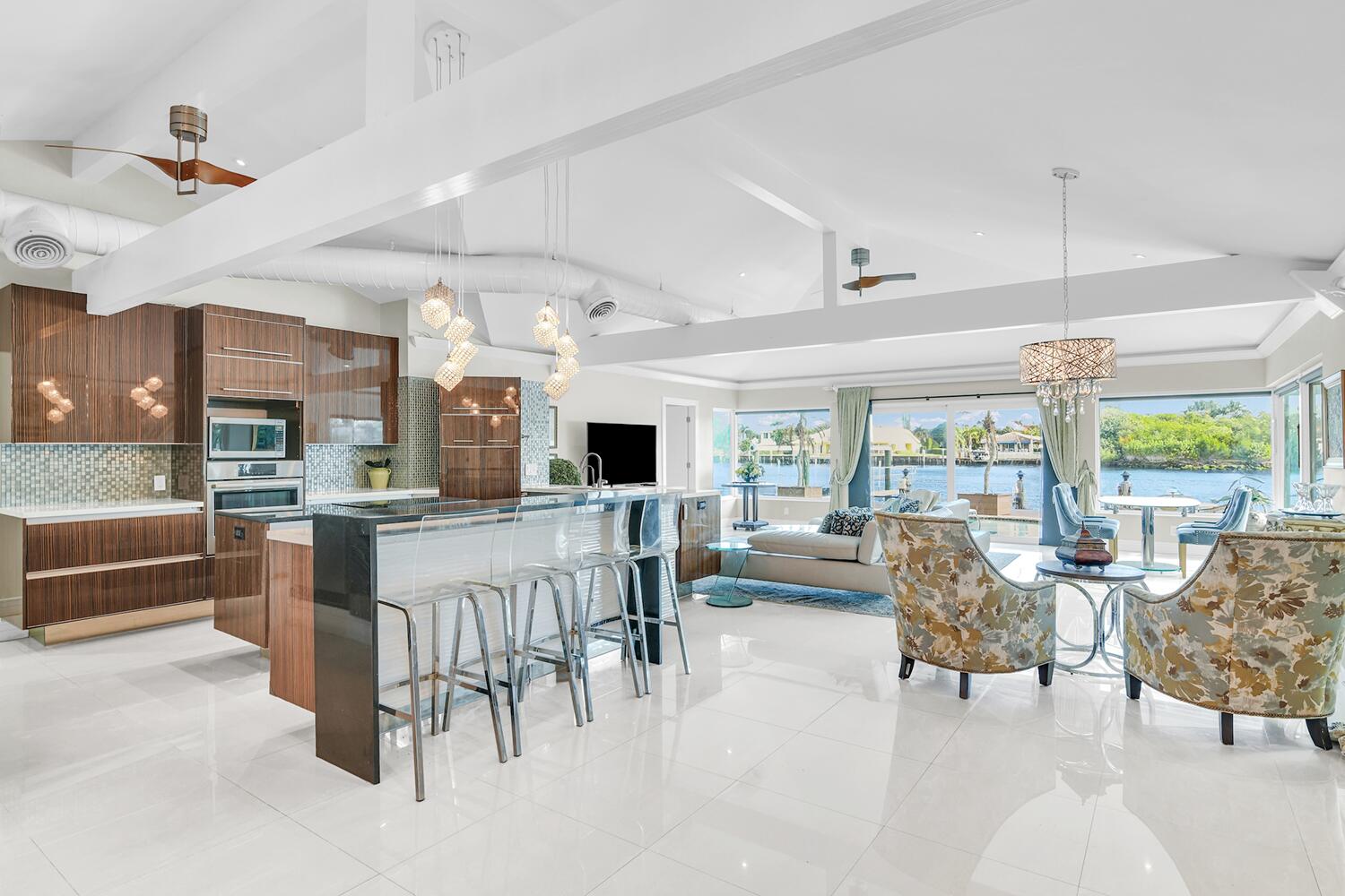 655 Castilla Lane Boynton Beach, FL 33435 - Photo 9 of 23 a living room with furniture and a large window