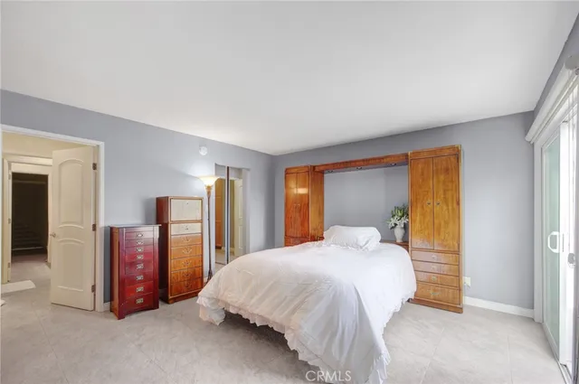 a front view of a house with outdoor seating