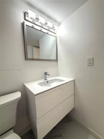 a close view of a toilet in the bathroom