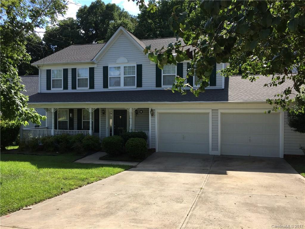 2224 Pimpernel Road Charlotte, NC 28213 - Photo 1 of 6 a front view of a house with garden
