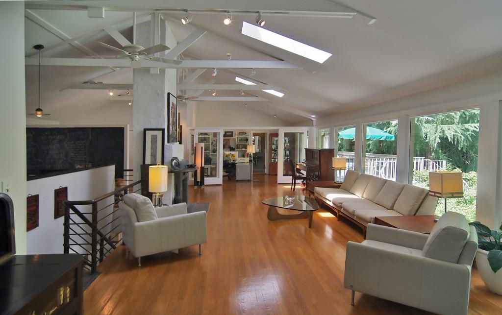 1699 Friar Tuck Road Northeast Atlanta, GA 30309 - Photo 1 of 1 a living room with furniture and a large window