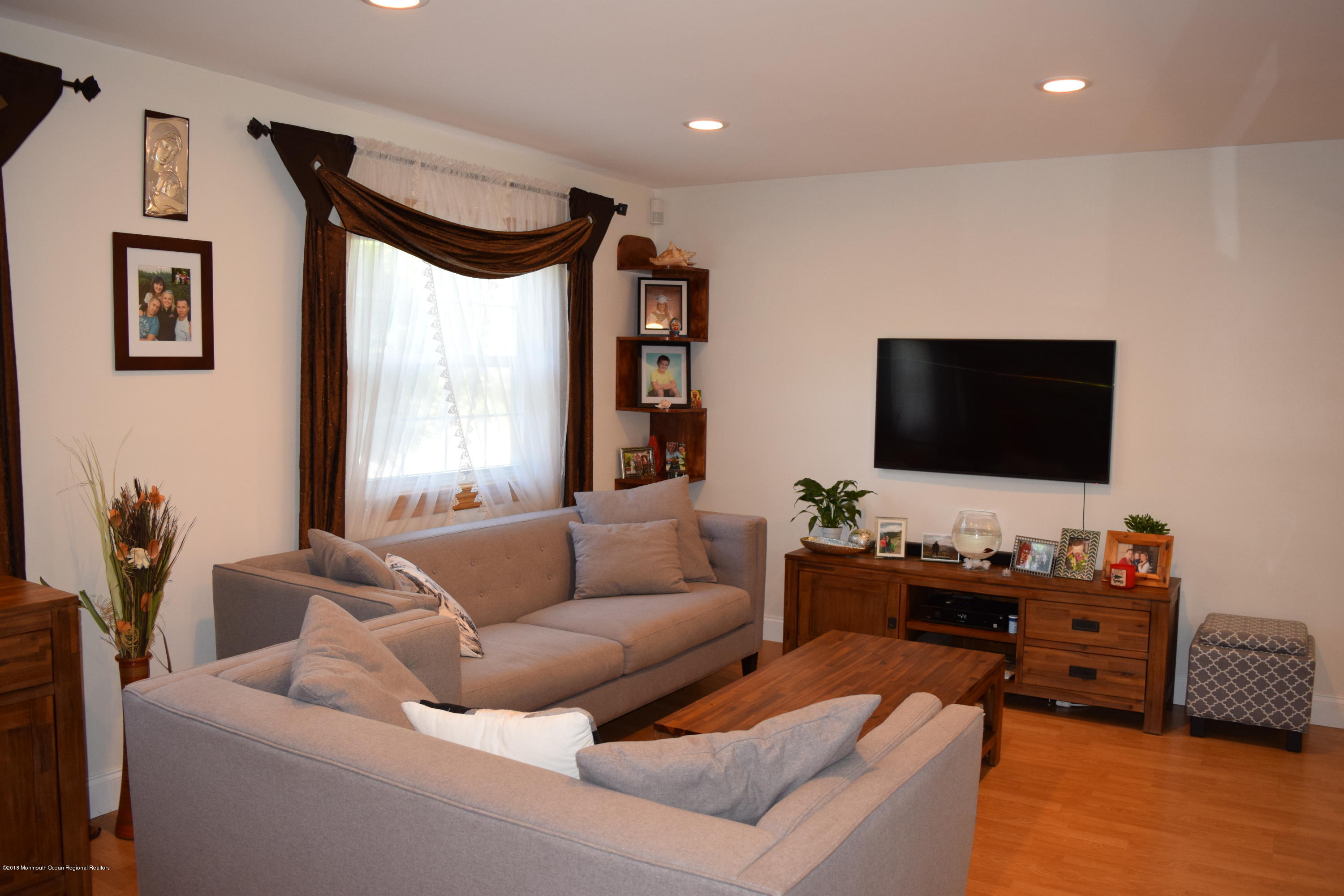 480 Adamston Road Brick, NJ 08723 - Photo 2 of 20 a living room with furniture and a flat screen tv