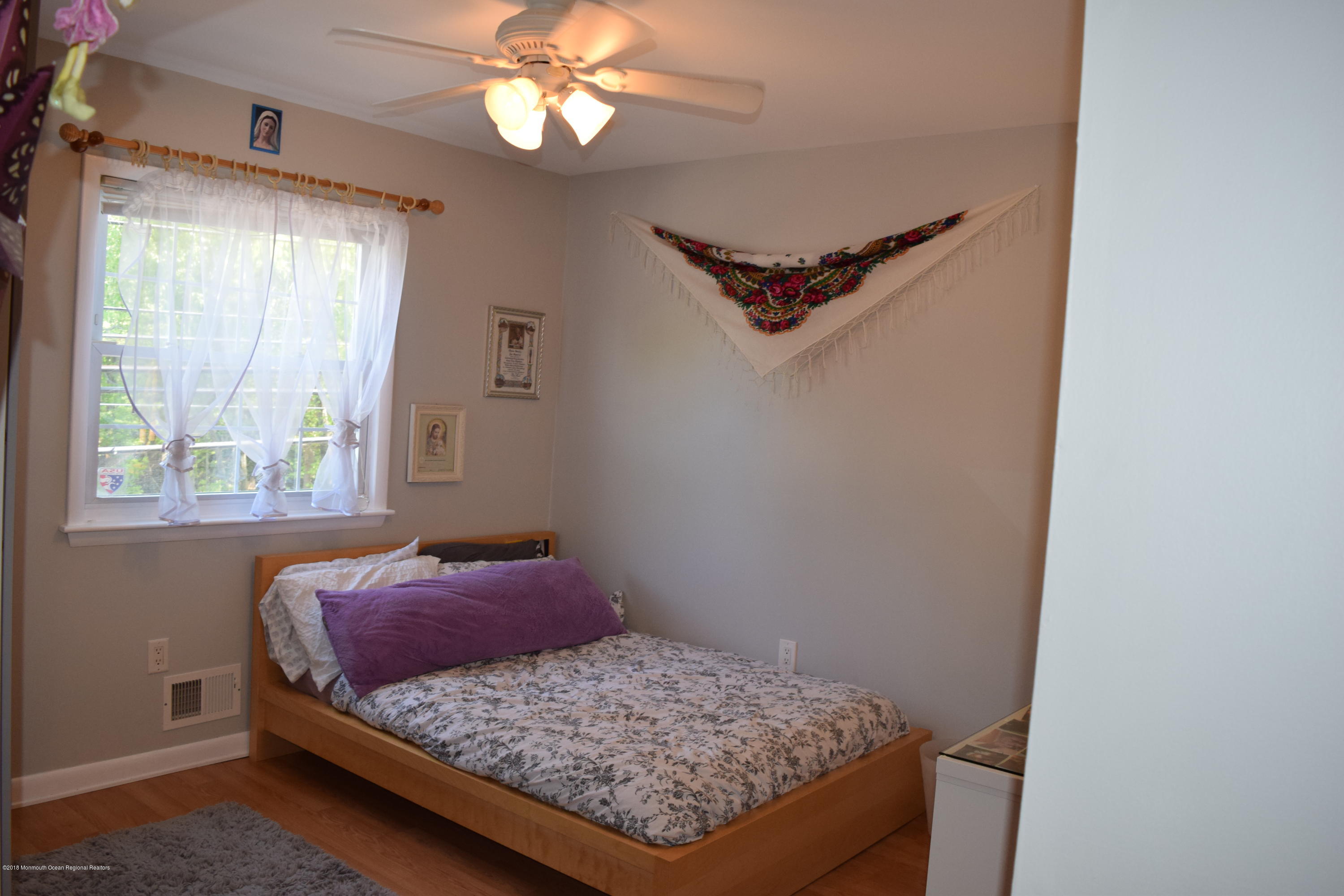 480 Adamston Road Brick, NJ 08723 - Photo 13 of 20 a bedroom with a bed and a window