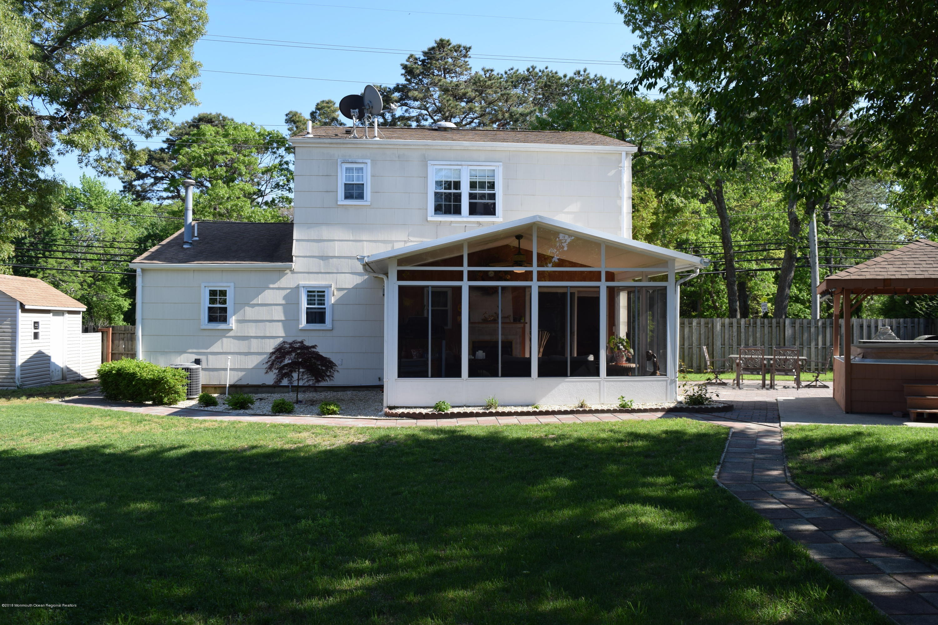 480 Adamston Road Brick, NJ 08723 - Photo 17 of 20 a view of a house with a yard and sitting area
