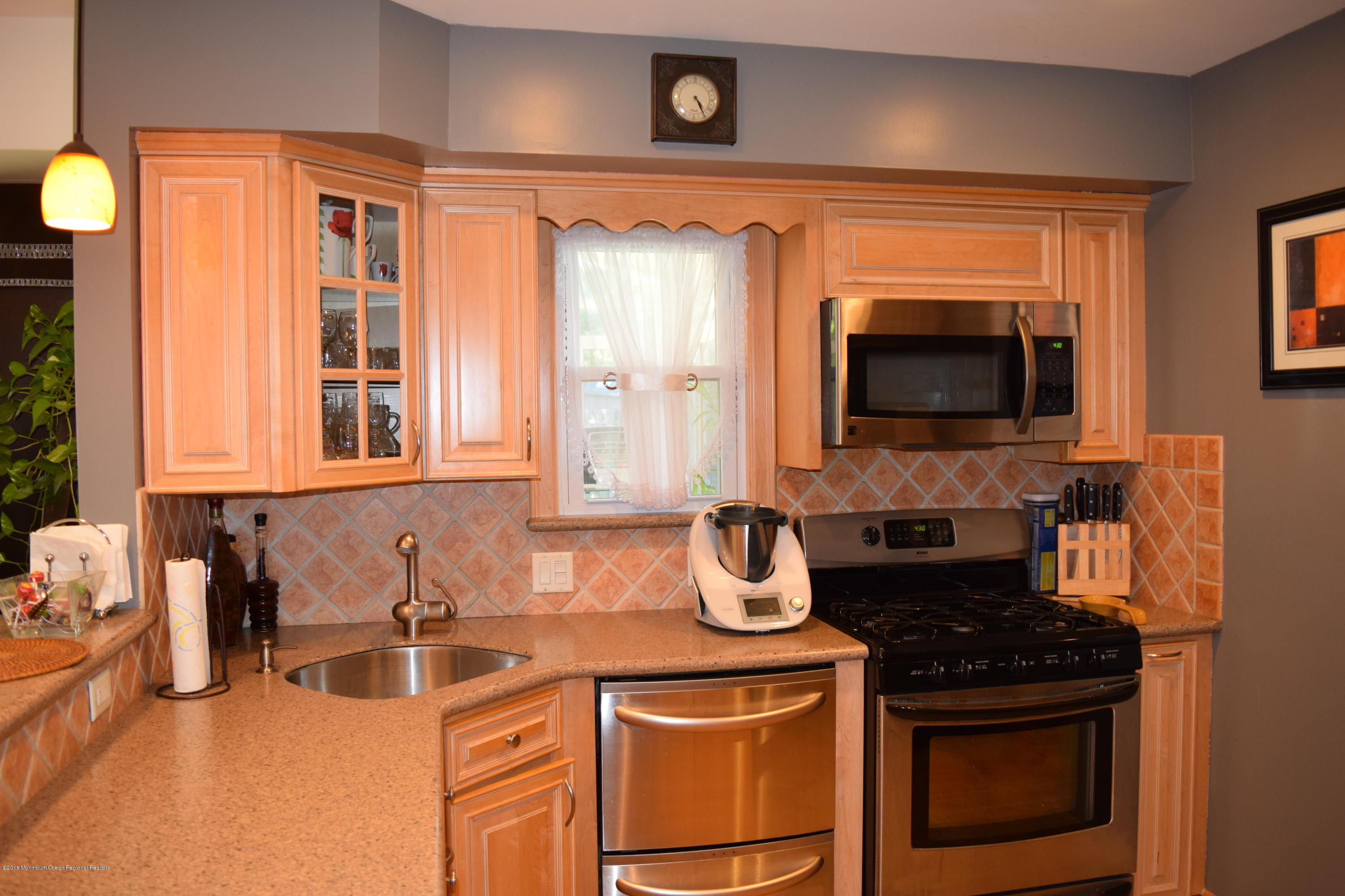 480 Adamston Road Brick, NJ 08723 - Photo 5 of 20 a kitchen with a sink stove and microwave