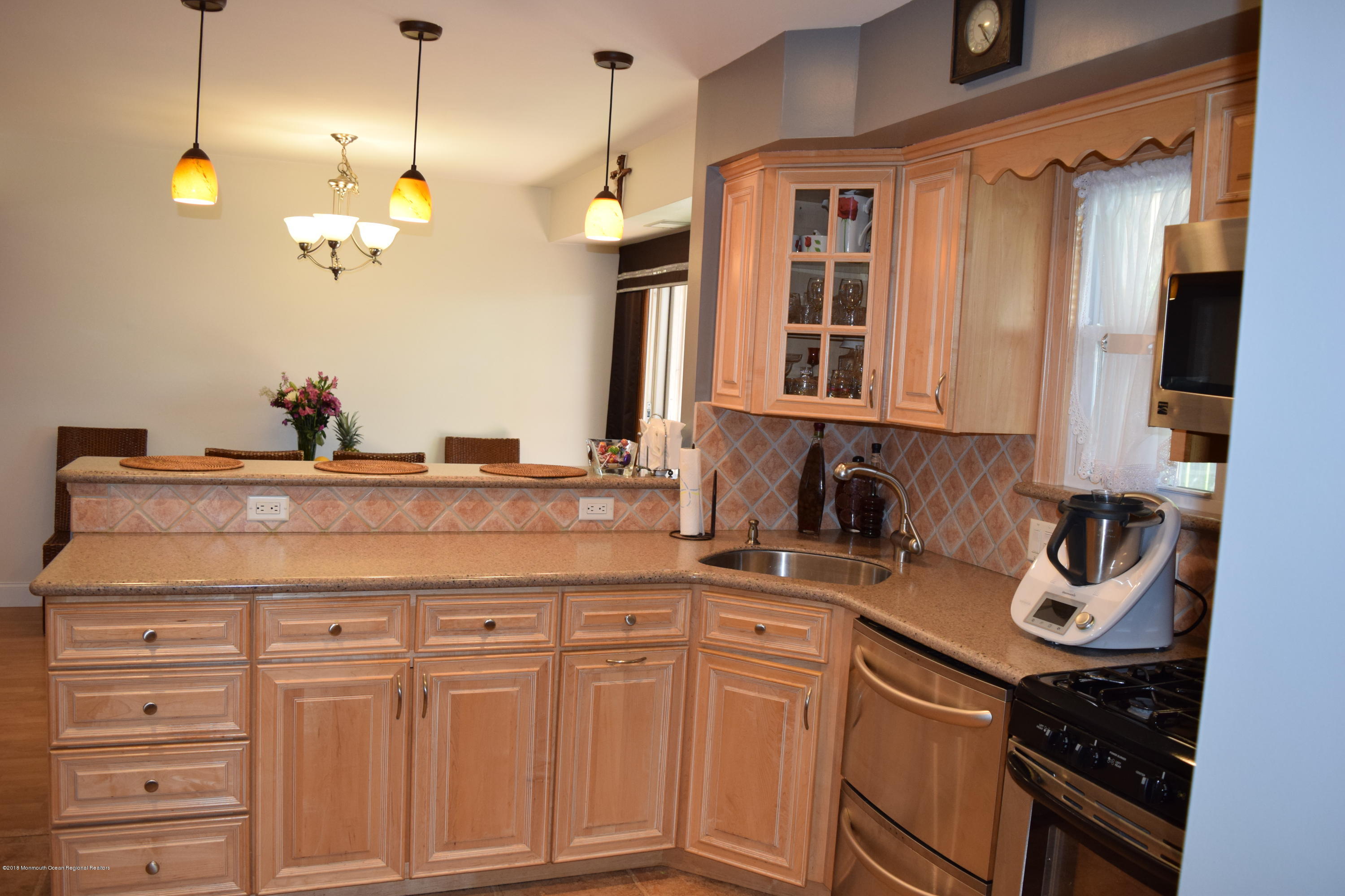 480 Adamston Road Brick, NJ 08723 - Photo 6 of 20 a bathroom with a sink a vanity and a mirror