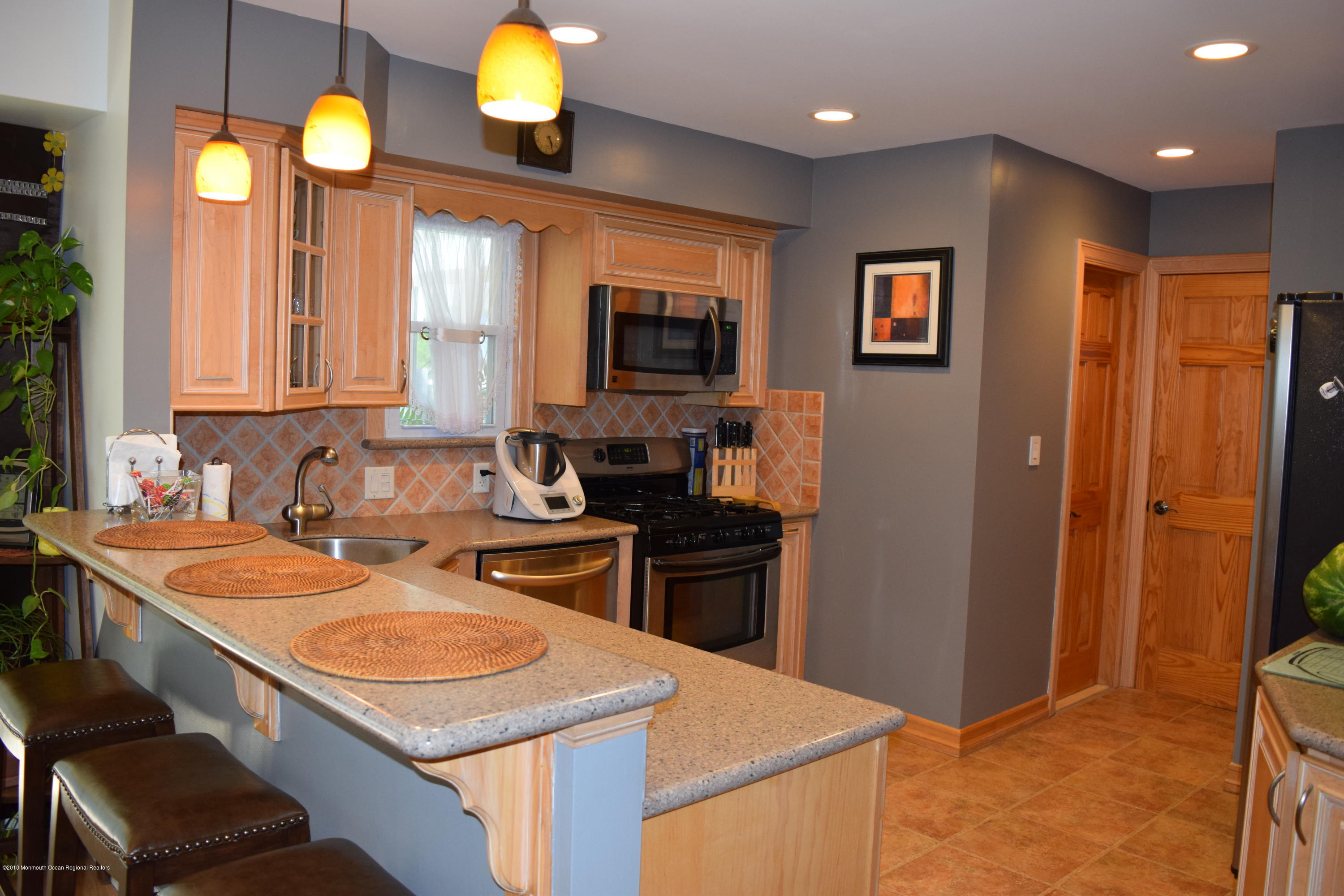 480 Adamston Road Brick, NJ 08723 - Photo 7 of 20 a kitchen that has a sink and a stove