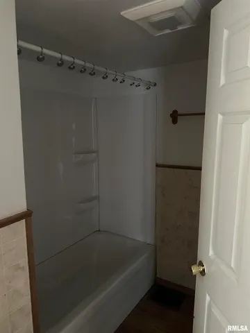 a bathroom with a bathtub