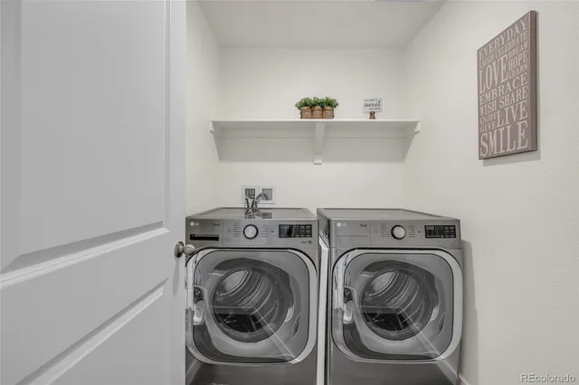 a utility room with dryer and washer