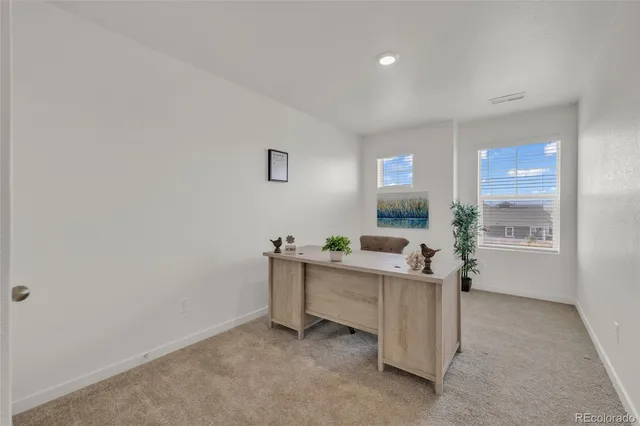 a room with furniture and window