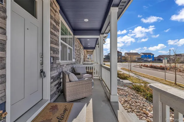 a view of a balcony with couch