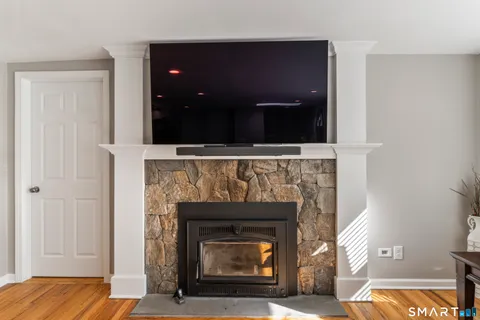a living room with a fireplace