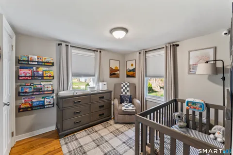 a view of kitchen with cabinets and wooden floor
