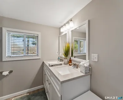 a view of a hallway with washer and dryer
