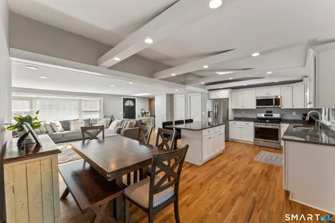 a view of a dining room kitchen and dining room