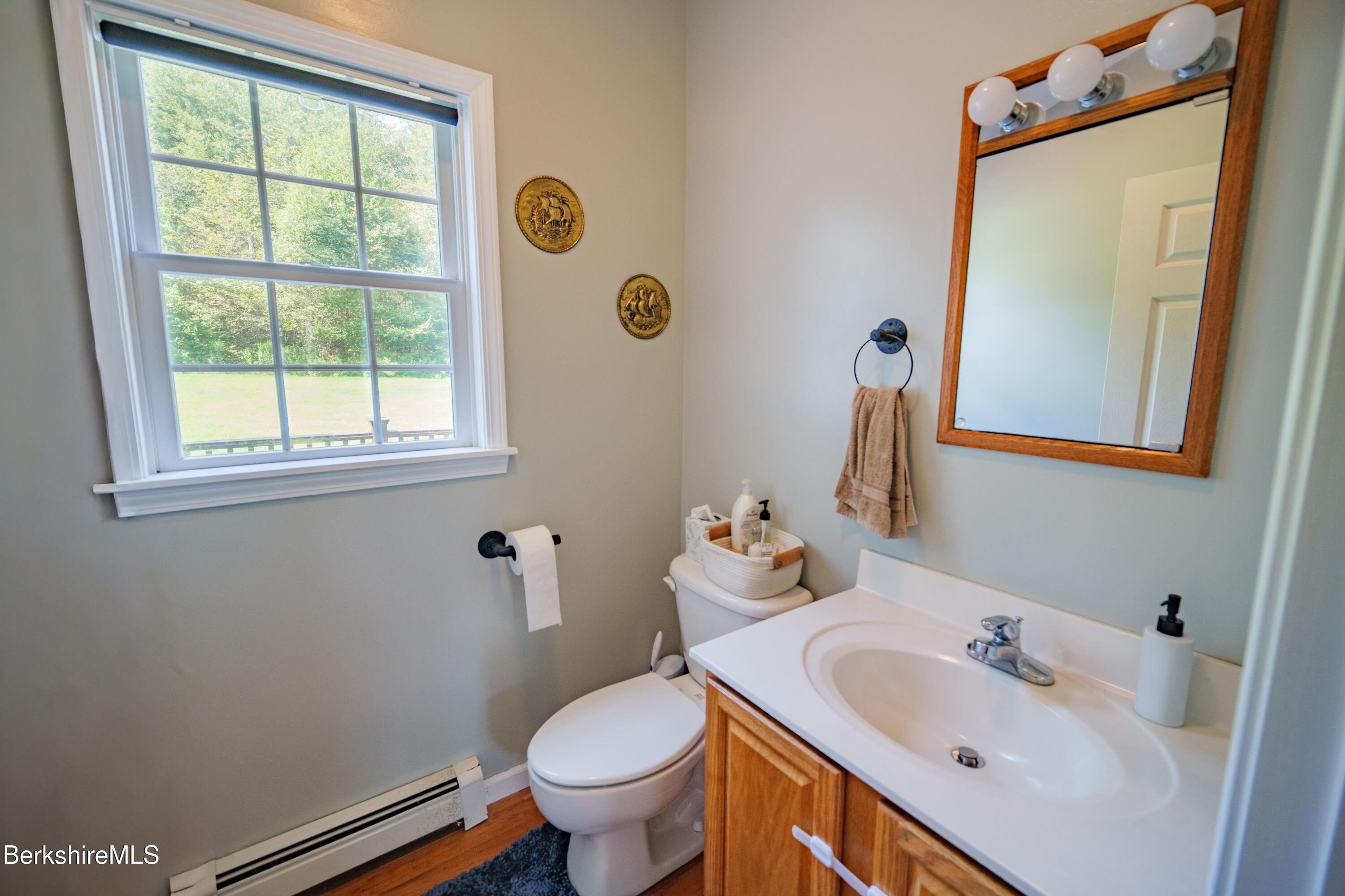 155 High St Hill Road Windsor, MA 01270 - Photo 11 of 26 a bathroom with a sink and a mirror