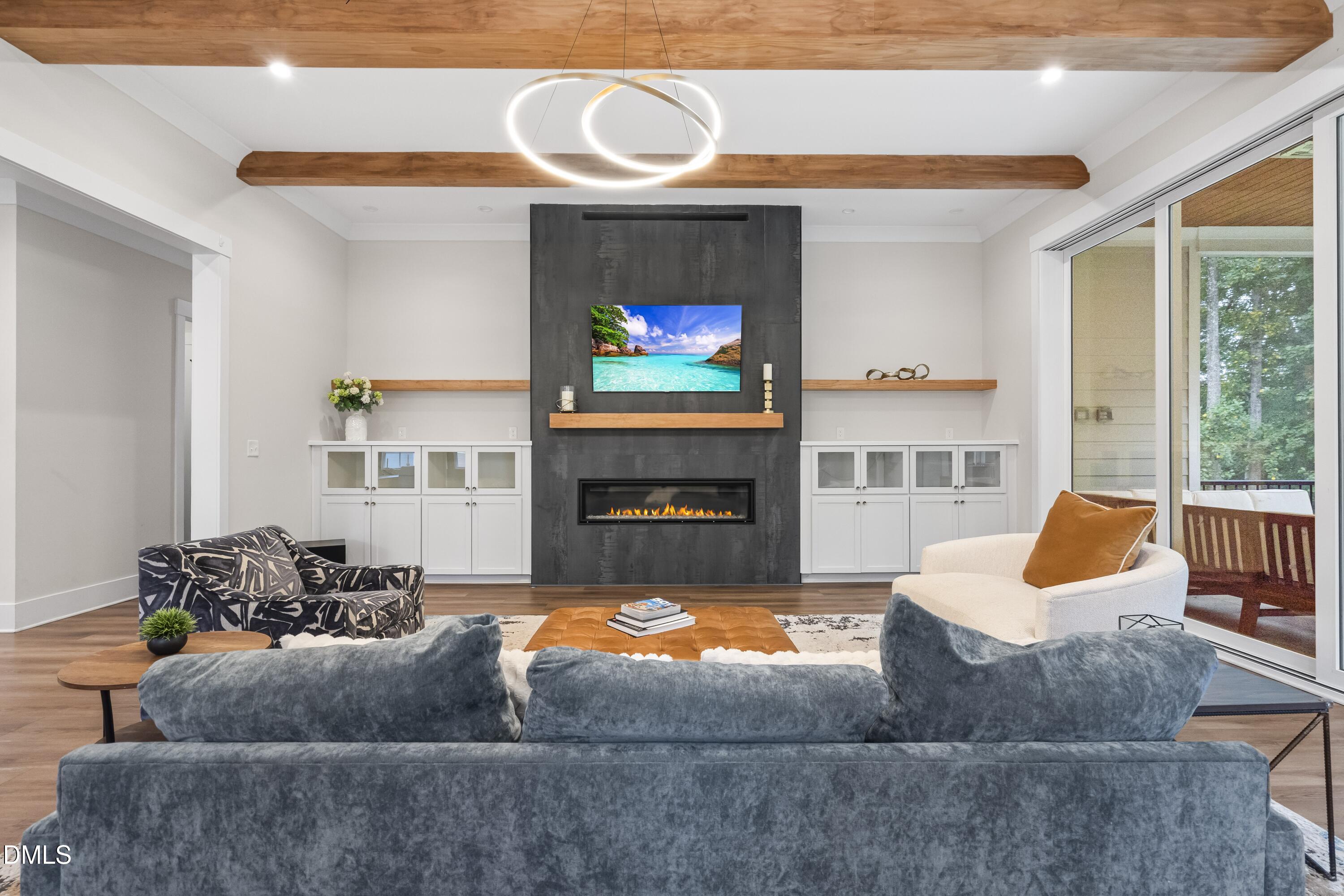 2205 Duskywing Drive Raleigh, NC 27613 - Photo 14 of 38 a living room with furniture and a fireplace